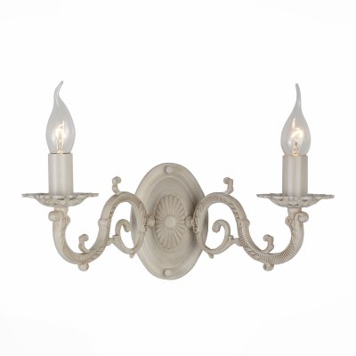 Светильник St Luce SL161.701.02 Светильник St Luce SL161.701.02Классические<br>Если Вы настроены купить светильник модели SL16170102, то обратите внимание: Коллекция светильников Genere - это торжество и роскошь античных мотивов в современном интерьере. Металлическое основание этих люстр уже само по себе является произведением искусства. Резные детали, элегантные завитки, массивные подсвечники - все эти элементы выглядят празднично и эффектно. А покрытие металла основания матовой краской цвета слоновой кости добавляет эстетичности и торжественности самому светильнику и интерьеру зала, кабинета, холла, которые он украсит.<br><br>Тип лампы: Накаливания / энергосбережения / светодиодная<br>Тип цоколя: E14<br>Количество ламп: 2<br>Ширина, мм: 360<br>MAX мощность ламп, Вт: 40<br>Высота, мм: 260