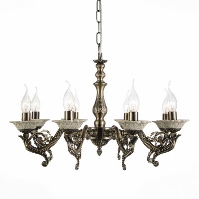 Светильник St Luce SL163.303.08 Светильник St Luce SL163.303.08Подвесные<br>Если Вы настроены купить светильник модели SL16330308, то обратите внимание: Сдержанность и одновременно торжественность характерны для светильников коллекции Vecchio. Глянцевое металлическое основание окрашено в цвет бронзы. Легкие ноты брутальности нивелируются изящными плафорами-свечками, декорированными керамическими чашами. Отсутствие каких-либо абажуров позволяет свету беспрепятственно распространяться по всему пространству комнаты равномерным потоком, освещая все вокруг. Светильники из коллекции Vecchio достойны королевских залов, но найдут место и в современном классическом интерьере зала, кабинета,холла гостиницы, ресторана.<br><br>Установка на натяжной потолок: Да<br>S освещ. до, м2: 16<br>Тип лампы: Накаливания / энергосбережения / светодиодная<br>Тип цоколя: E14<br>Количество ламп: 8<br>MAX мощность ламп, Вт: 40<br>Диаметр, мм мм: 560<br>Высота, мм: 360 - 870