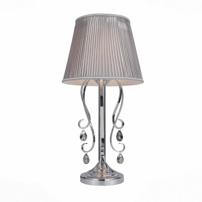 Светильник St Luce SL177.104.01 Светильник St Luce SL177.104.01Современные<br>Если Вы настроены купить светильник модели SL17710401, то обратите внимание: Люстры коллекции Azzurroсочетают классические традиции и черты современных стилистических направлений. Изящное металлическое основание светильников окрашено в цвет хрома. Мягкие складки ткани-плиссе классических абажуров сохраняют строгость, при том , что создают уют и ощущение умиротворённости. Особый шик этим моделям добавляют подвески, которые закреплены на тонких, изящно выгнутых металлических прутьях. Кристаллы серого хромированного оттенка гармонично дополняют образ моделей Azzurro. Люстры коллекции Azzurro создают уют и настроение в помещении , добавляют разноуровневый свет, мягко ниспадающий из-под абажура.<br><br>Тип лампы: Накаливания / энергосбережения / светодиодная<br>Тип цоколя: E14<br>Количество ламп: 1<br>MAX мощность ламп, Вт: 40<br>Диаметр, мм мм: 280<br>Высота, мм: 560