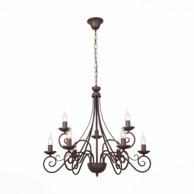 Люстра подвесная St luce SL313.703.09 Люстра подвесная St luce SL313.703.09Подвесные<br>Модели коллекции Maniero напоминают нам о брутальном и романтичном Средневековье, временах, когда дома освещались только свечами. Натуральные материалы, увесистая гнутая арматура, плафоны в виде свечей-эти люстры станут украшением интерьеров в стиле кантри, классики, фьюжен.<br><br>Тип лампы: Накаливания / энергосбережения / светодиодная<br>Тип цоколя: E14<br>Цвет арматуры: коричневый<br>Количество ламп: 9<br>Диаметр, мм мм: 700<br>Высота, мм: 570 - 1200<br>MAX мощность ламп, Вт: 40