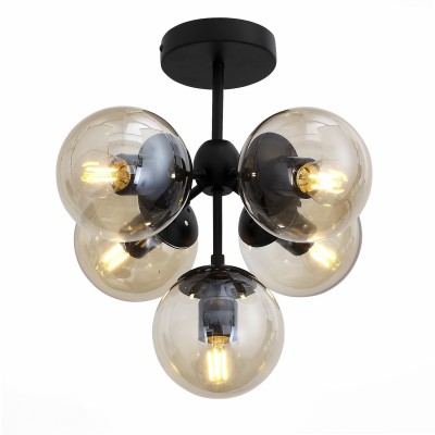Светильник St luce SL549.402.05 Светильник St luce SL549.402.05Потолочные<br>Если Вы настроены купить светильник модели SL54940205, то обратите внимание: Содержание важнее формы – именно так можно охарактеризовать необычную коллекцию светильников Stampo. Прозрачные стеклянные шары-плафоны начинают сверкать и переливаться, стоит только зажечь свет. Однако это не китч, а сдержанная современная стилистика, которая подчеркивает интерьер помещения, а не перекрывает его. В коллекции две вариации люстр: с тремя и пятью шарами на матовом черном каркасе . Безупречные пропорции позволяют использовать светильники в помещении любых форм и размеров – гармония дизайна уравновесит даже нестандартную геометрию.<br><br>Установка на натяжной потолок: Да<br>S освещ. до, м2: 15<br>Тип лампы: Накаливания / энергосбережения / светодиодная<br>Тип цоколя: E27<br>Количество ламп: 5<br>Диаметр, мм мм: 450<br>Высота, мм: 380<br>MAX мощность ламп, Вт: 60