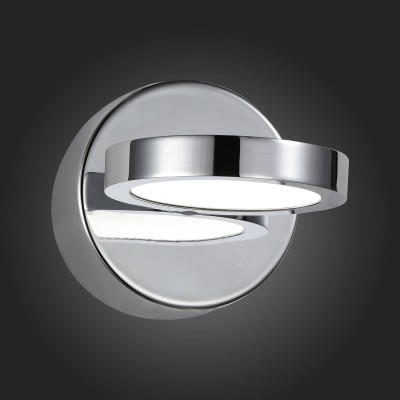 Светильник St Luce SL588.501.01 Светильник St Luce SL588.501.01Хай-тек<br>Если Вы настроены купить светильник модели SL58850101, то обратите внимание: Форма светильников Colo нарочито проста. Их можно использовать как архитектурный свет при освещении квартир, домов, коттеджей. Направление света можно регулировать за счет поворотного механизма. Бра изготовлены из металла с покрытием хром и белого акрила. Источник света – LED.<br><br>Цветовая t, К: 4000<br>Тип лампы: LED<br>Ширина, мм: 90<br>MAX мощность ламп, Вт: 4.5<br>Расстояние от стены, мм: 125<br>Высота, мм: 90<br>Цвет арматуры: серебристый