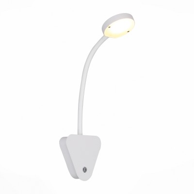 Светильник настенный St luce SL607.501.01 Светильник настенный St luce SL607.501.01Хай-тек<br>Оригинальный и нестандартный светильник коллекции Siegen открывает простор для фантазии и ничем не ограничивает скрытые дизайнерские способности. Металлическое основание черного или белого цвета, рожок, плавно переходящий в металлический плафон цвета основания, источник света LED,скрытый плафоном из матового акрила .Главная особенность светильника – рожок ,выполненный из силикона, благодаря чему легко гнется во всех направлениях и позволяет создавать разнообразные световые композиции.<br><br>Цветовая t, К: 3000<br>Тип лампы: LED<br>Тип цоколя: LED<br>Цвет арматуры: белый<br>Количество ламп: 1<br>Ширина, мм: 125<br>Высота, мм: 390<br>MAX мощность ламп, Вт: 6