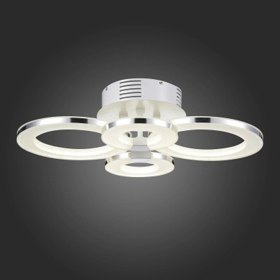 Светильник St Luce SL903.102.04 Светильник St Luce SL903.102.04Потолочные<br>Если Вы настроены купить светильник модели SL90310204, то обратите внимание: Светильники из коллекции Guida – это воплощение гармонии . Акриловые матовые кольца с яркой металлической окантовкой цвета хром, надёжно закреплённые на металлическом основании, окрашенном в белый цвет, выглядят элегантно, в меру строго и празднично.<br> Плафоны закрытые, внутри размещена светодиодная лента. Лампы обеспечивают ровное свечения, не создают теней и бликов. Светильники Guida могут стать центральной композицией в интерьере дома или квартиры, оформленных в стиле минимализм, хай- тек или техно.<br><br>Установка на натяжной потолок: Да<br>S освещ. до, м2: 26<br>Цветовая t, К: 4000<br>Тип лампы: LED<br>Тип цоколя: LED<br>Ширина, мм: 475<br>MAX мощность ламп, Вт: 64<br>Длина, мм: 605<br>Высота, мм: 190