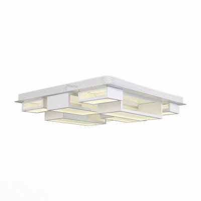 Светильник St Luce SL934.502.09 Светильник St Luce SL934.502.09Потолочные<br>Если Вы настроены купить светильник модели SL93450209, то обратите внимание: Объемная композиция под потолком всегда выглядит эффектно . Коллекция светильников Mecano тому прямое доказательство. Используя призмы разных размеров, авторы создали уникальный шедевр.Корпус светильника выполнен из металла цвета серебра и белых матовых плафонов. Кажется, что свет движется, отдавая вниз лишь часть своего потока. Этот необычный светильник станет достойным украшением вашего дома или офиса, подарит настроение и индивидуальности общественному месту, будет настоящим арт обьектом современной квартиры-студии.<br><br>Установка на натяжной потолок: Да<br>S освещ. до, м2: 58<br>Цветовая t, К: 4000<br>Тип лампы: LED<br>Тип цоколя: LED<br>Количество ламп: 1<br>Ширина, мм: 680<br>Длина, мм: 680<br>Высота, мм: 140<br>MAX мощность ламп, Вт: 146