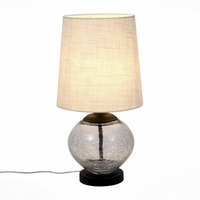 Светильник St Luce SL971.104.01 Светильник St Luce SL971.104.01Современные<br>Если Вы настроены купить светильник модели SL97110401, то обратите внимание: Коллекция светильников Ampolla - это сочетание классических плафонов с уникальными стеклянными основаниями- настоящими шедеврами стеклодувов. Прозрачный каркас светильников, попадая под направленный световой поток , создает ощущение невесомости, и кажется, что абажур парит в воздухе. Свет, отражаясь от стекла, игривыми лучами разлетается по всей комнате, наполняя ее настроением и уютом. Матовый абажур сдерживает естественную яркость лампы, приглушает свет и создает приятную приватную атмосферу.<br><br>Тип лампы: Накаливания / энергосбережения / светодиодная<br>Тип цоколя: E27<br>Количество ламп: 1<br>MAX мощность ламп, Вт: 60<br>Диаметр, мм мм: 300<br>Высота, мм: 570