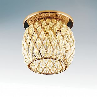 Lightstar OBUNGO 4422 Светильник Lightstar OBUNGO 4422 СветильникХрустальные<br>Встраиваемые светильники – популярное осветительное оборудование, которое можно использовать в качестве основного источника или в дополнение к люстре. Они позволяют создать нужную атмосферу атмосферу и привнести в интерьер уют и комфорт. Интернет-магазин «Светодом» предлагает стильный встраиваемый светильник Lightstar 4422. Данная модель достаточно универсальна, поэтому подойдет практически под любой интерьер. Перед покупкой не забудьте ознакомиться с техническими параметрами, чтобы узнать тип цоколя, площадь освещения и другие важные характеристики. Приобрести встраиваемый светильник Lightstar 4422 в нашем онлайн-магазине Вы можете либо с помощью «Корзины», либо по контактным номерам. Мы развозим заказы по Москве, Екатеринбургу и остальным российским городам.<br><br>Тип лампы: галогенная/LED<br>Тип цоколя: G9<br>Количество ламп: 1<br>MAX мощность ламп, Вт: 40<br>Размеры: D77 H73<br>Оттенок (цвет): золото<br>Цвет арматуры: Золотой