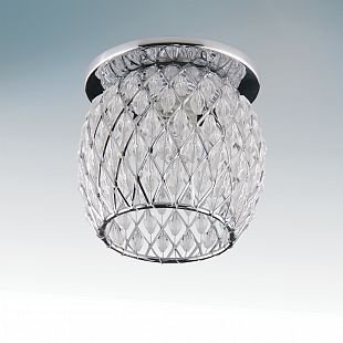 Lightstar OBUNGO 4424 Светильник Lightstar OBUNGO 4424 СветильникХрустальные<br>Встраиваемые светильники – популярное осветительное оборудование, которое можно использовать в качестве основного источника или в дополнение к люстре. Они позволяют создать нужную атмосферу атмосферу и привнести в интерьер уют и комфорт. Интернет-магазин «Светодом» предлагает стильный встраиваемый светильник Lightstar 4424. Данная модель достаточно универсальна, поэтому подойдет практически под любой интерьер. Перед покупкой не забудьте ознакомиться с техническими параметрами, чтобы узнать тип цоколя, площадь освещения и другие важные характеристики. Приобрести встраиваемый светильник Lightstar 4424 в нашем онлайн-магазине Вы можете либо с помощью «Корзины», либо по контактным номерам. Мы доставляем заказы по Москве, Екатеринбургу и остальным российским городам.<br><br>Тип лампы: галогенная/LED<br>Тип цоколя: G9<br>Количество ламп: 1<br>MAX мощность ламп, Вт: 40<br>Размеры: D77 H73<br>Оттенок (цвет): хром<br>Цвет арматуры: серебристый