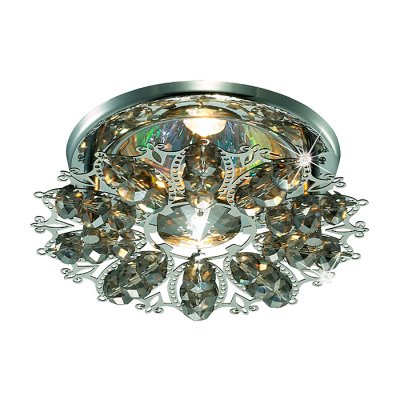 Novotech AURORA 369498 Встраиваемый светильник Novotech AURORA 369498 Встраиваемый светильникХрустальные<br>Декоративный встраиваемый неповоротный светильник модели Novotech 369498 из серии AURORA отличается следующим качеством: Светильник сделан из металла. Это популярный и востребованный материал благодаря ряду качеств. К ним относится: повышенная прочность, износостойкость и долговечность. Декоративные бусины произведены из хрусталя. Хрусталь обладает высоким показателем плотности, прозрачности и блеска. Благодаря содержанию свинца (не менее 30%) и определённому подбору углов, образуемых гранями, изделия из хрусталя отличаются необыкновенно яркой, многоцветной игрой света, чарующей магией красоты, совершенства и роскоши.<br><br>S освещ. до, м2: 3<br>Тип лампы: галогенная<br>Тип цоколя: GU5.3 (MR16)<br>Количество ламп: 1<br>MAX мощность ламп, Вт: 50<br>Диаметр, мм мм: 105<br>Диаметр врезного отверстия, мм: 60<br>Высота, мм: 65<br>Оттенок (цвет): под дерево<br>Цвет арматуры: серебристый