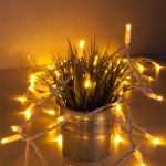 Праздничная гирлянда нить теплый белый с эффектом мерцания 20м IP65 400-102 Eurosvet