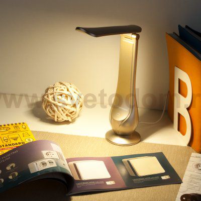 Настольный светодиодный светильник Orbit золотой TL90420 Elektrostandard
