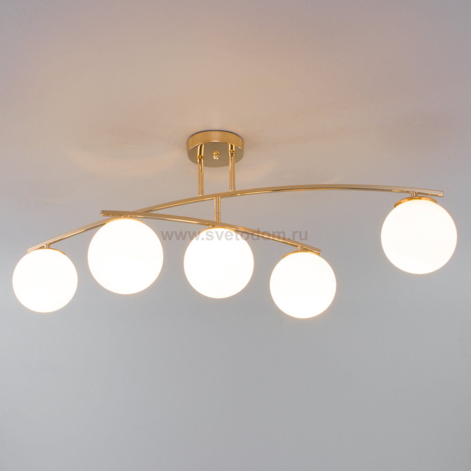 Потолочная люстра с поворотным рожком Eurosvet 30170/5 золото Bronx